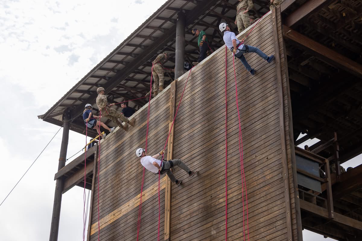 Keith Taul rappelling the 70-foot wall during cadet training at Fort Knox